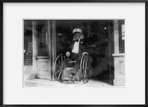 1911 Photo Maj. Gen. Daniel E. Sickles in wheelchair; coming out of building