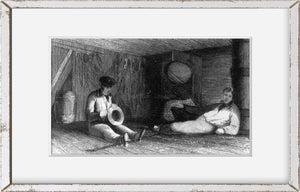 Vintage photograph: The Hold of the Ship - Two men shackled to the floor