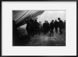 c1908 Sept. 29 photograph of Spectators lifting the aeroplane from the bodies of