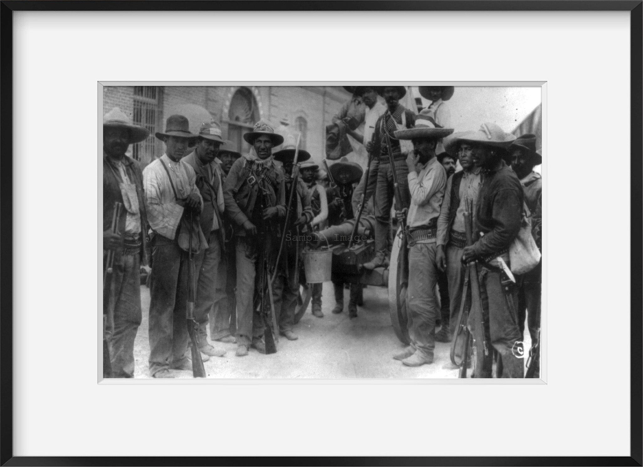 1911 May 20 photograph of Mexican inusrrectionists with home-made cannon in Juar