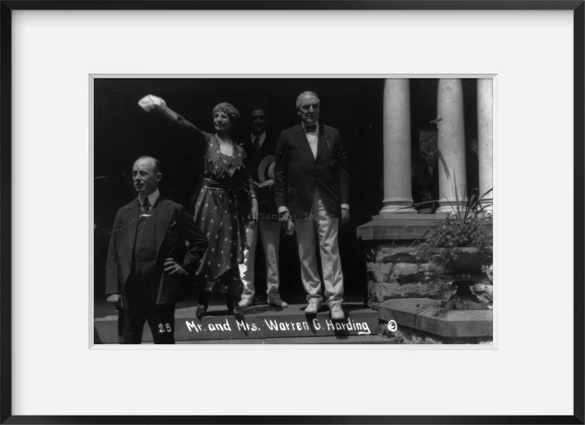 c1920 photograph of Mr. & Mrs. Warren G. Harding standing on steps of building