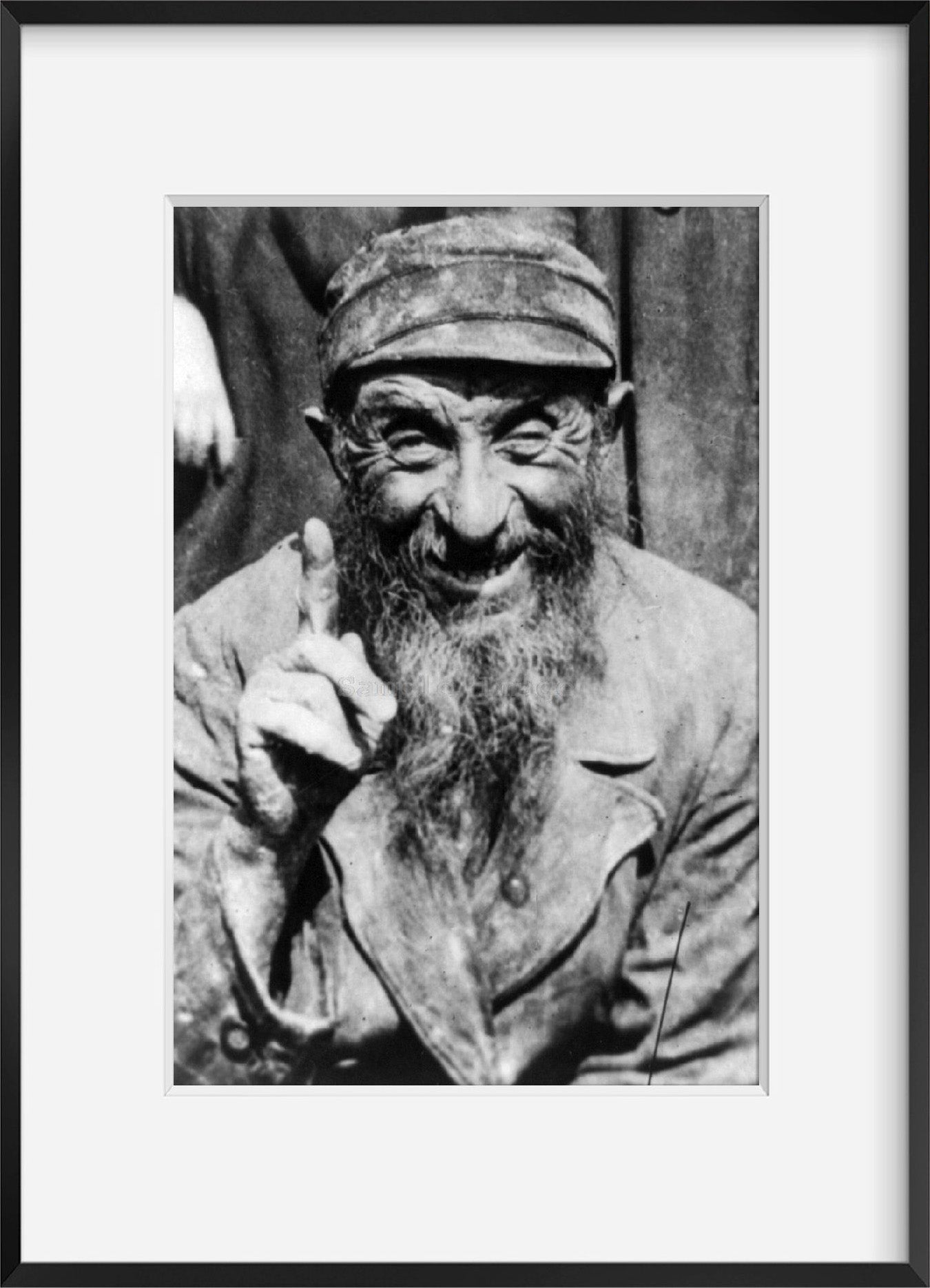193-? photograph of Galician Jew Summary: Head and shoulders portrait of grinnin
