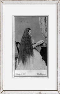 Vintage between 1860 and 1870 photograph of Mrs. Gen. M. Vickers(?) with long fl