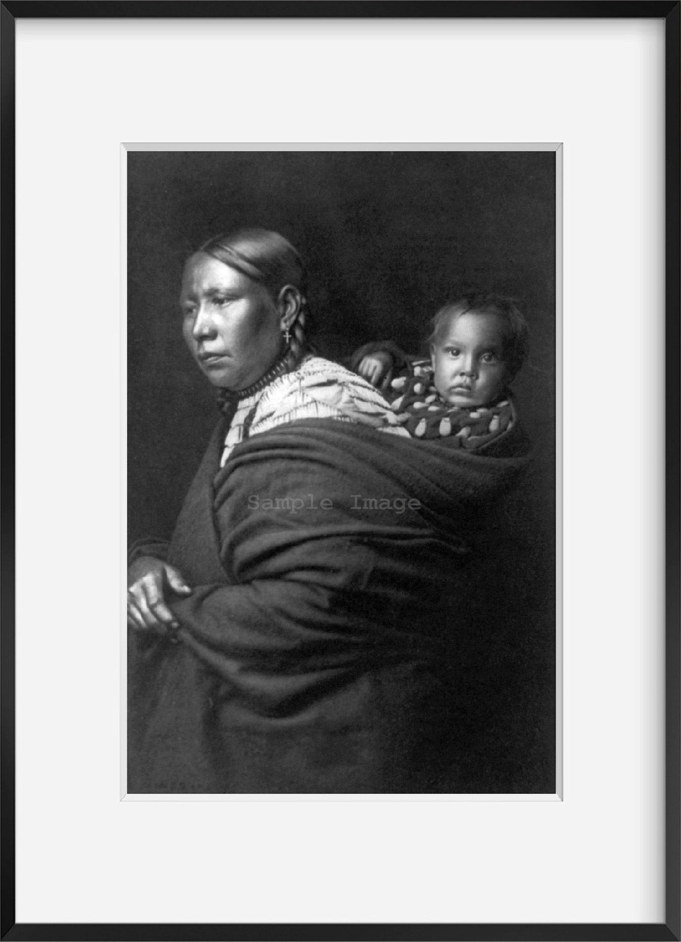 Photograph of Mother and Child Summary: Teton Sioux squaw and papoose.