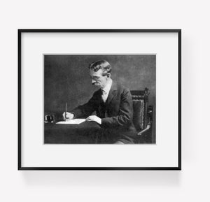 1919 photograph of Richard Rathbun Summary: Half lgth., seated at table and writ