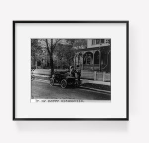 Photo: Oldsmobile, 1907, Automobile, Car, man helping woman into car, house, street