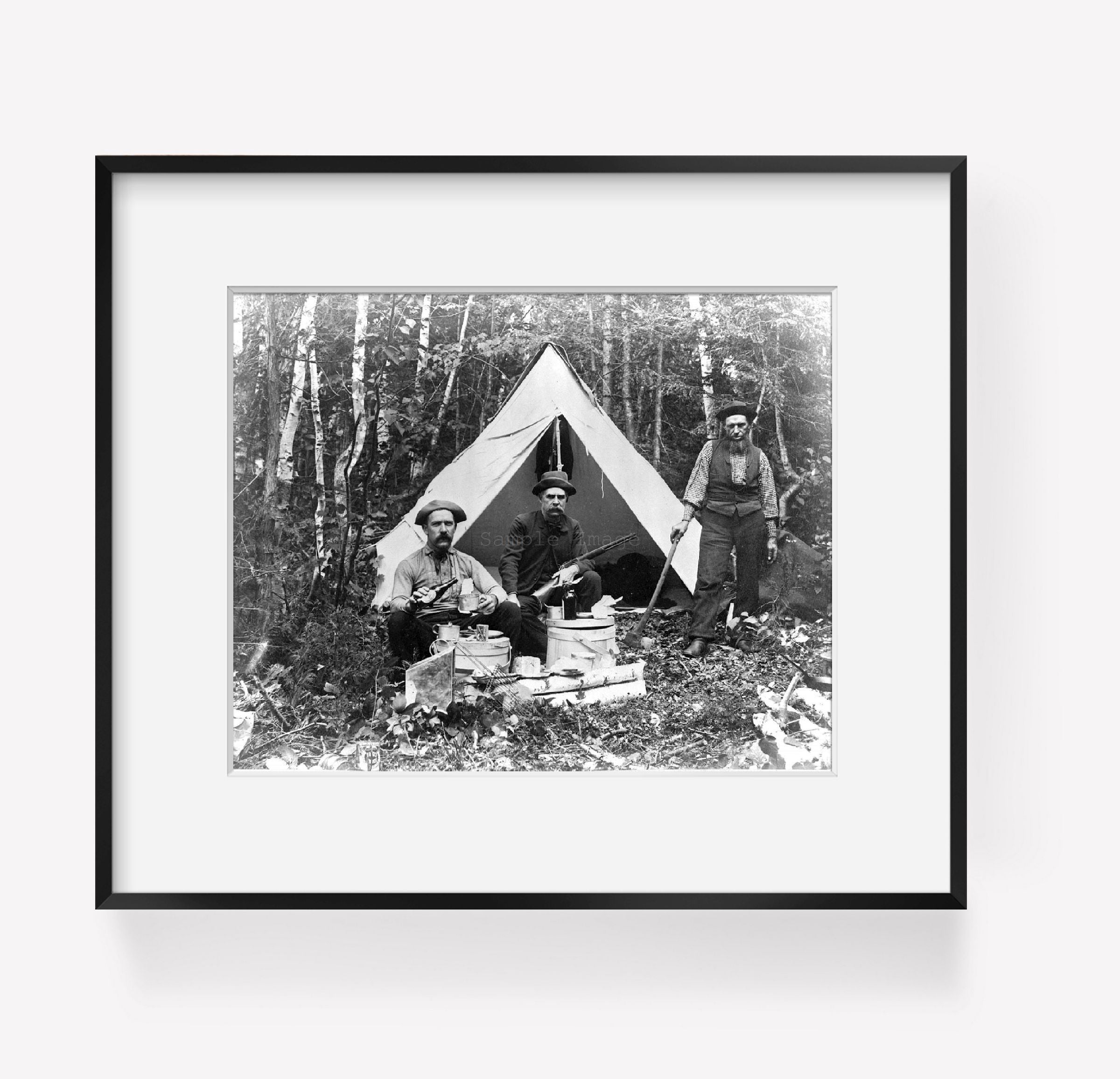 Photo: Camp at Norcross Brook, axe, rifle, man pouring drink, tent, Camping, Maine, ME,