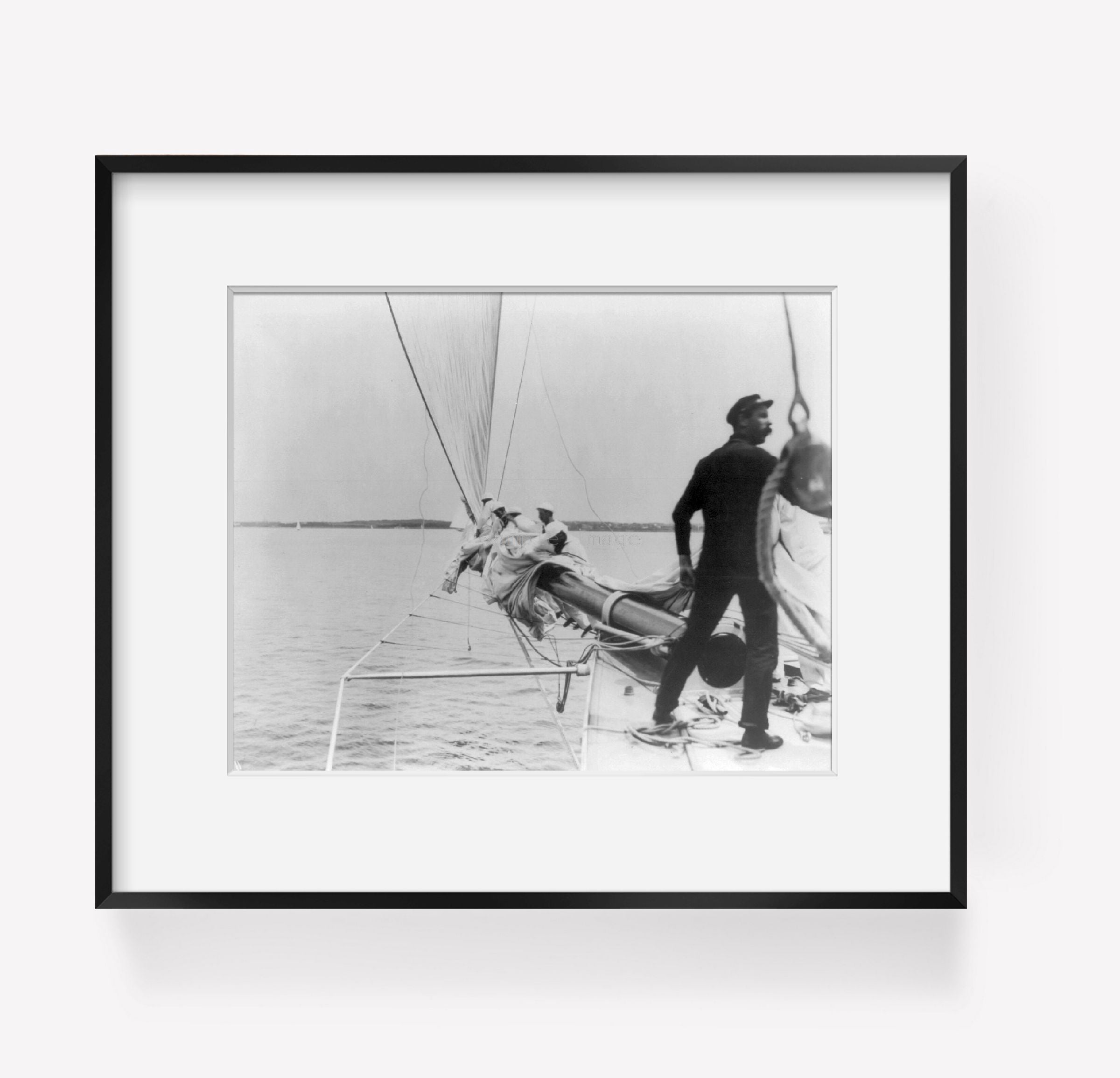 Photo: RELIANCE, sailing yacht, furling the jib, c1903