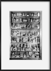 Photo: Shelf display of 100 rare penny banks, c1937, photo by Andrew Emerine, cabin