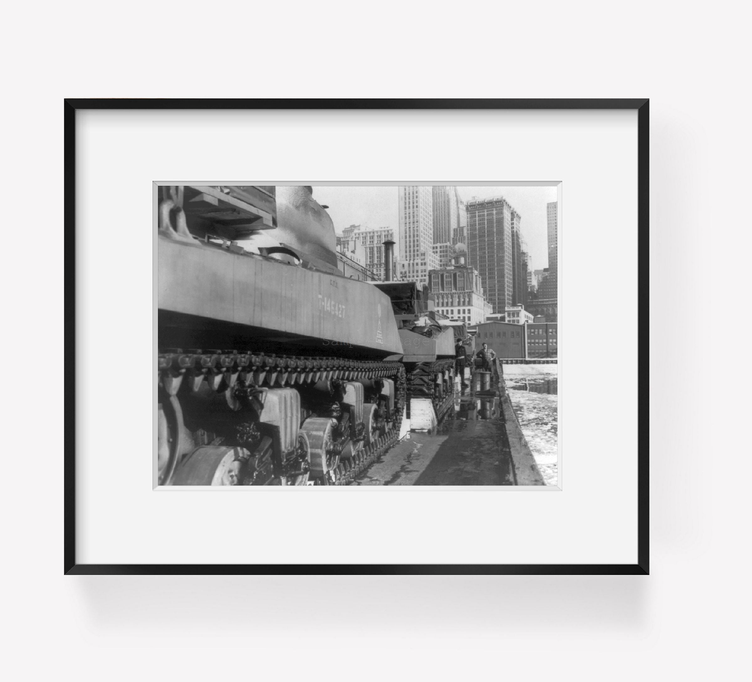 Photo: Army tanks on barge in icy water, New York Harbor, skyscrapers, NY, Febuary 1