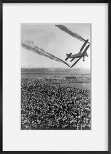 1935 July 14 photograph of Siemens-Stieglitz D-Ekro biplane releasing smoke stre