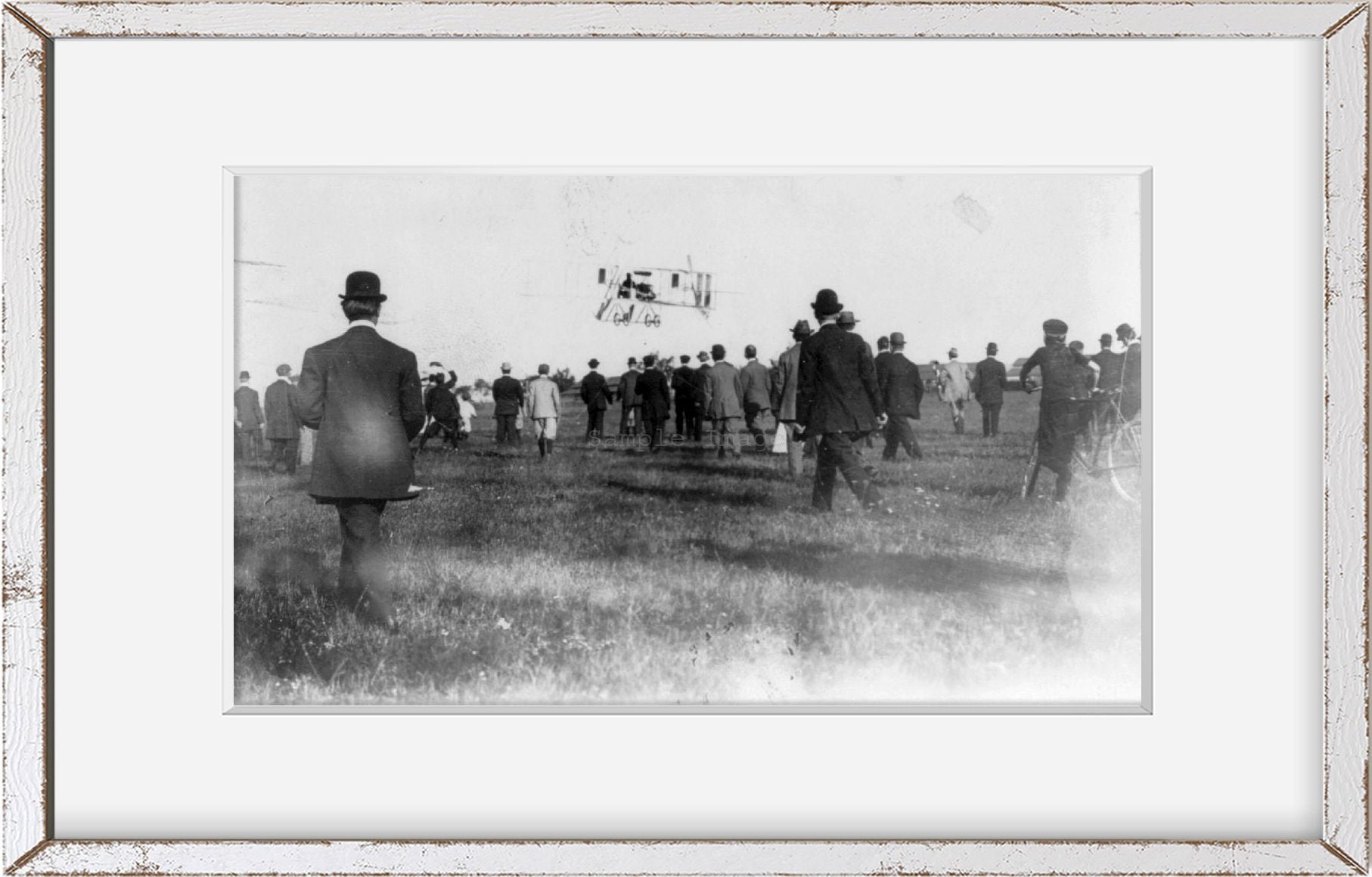 1911 Photo Calbreath [i.e. Calbraith] Rodgers Aloft in plane; large crowd in for