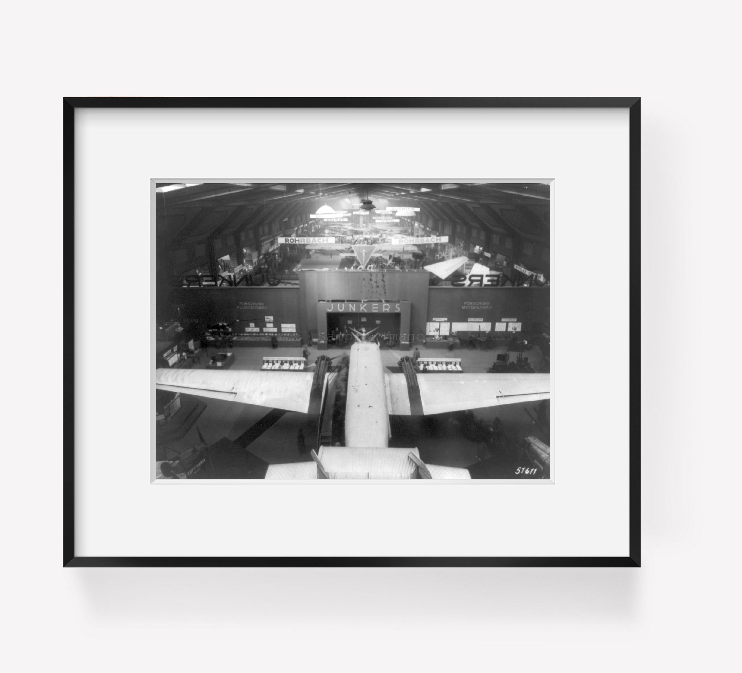 ca. 1930 photograph of Exhibits at Berlin air show; birds-eye view inside large