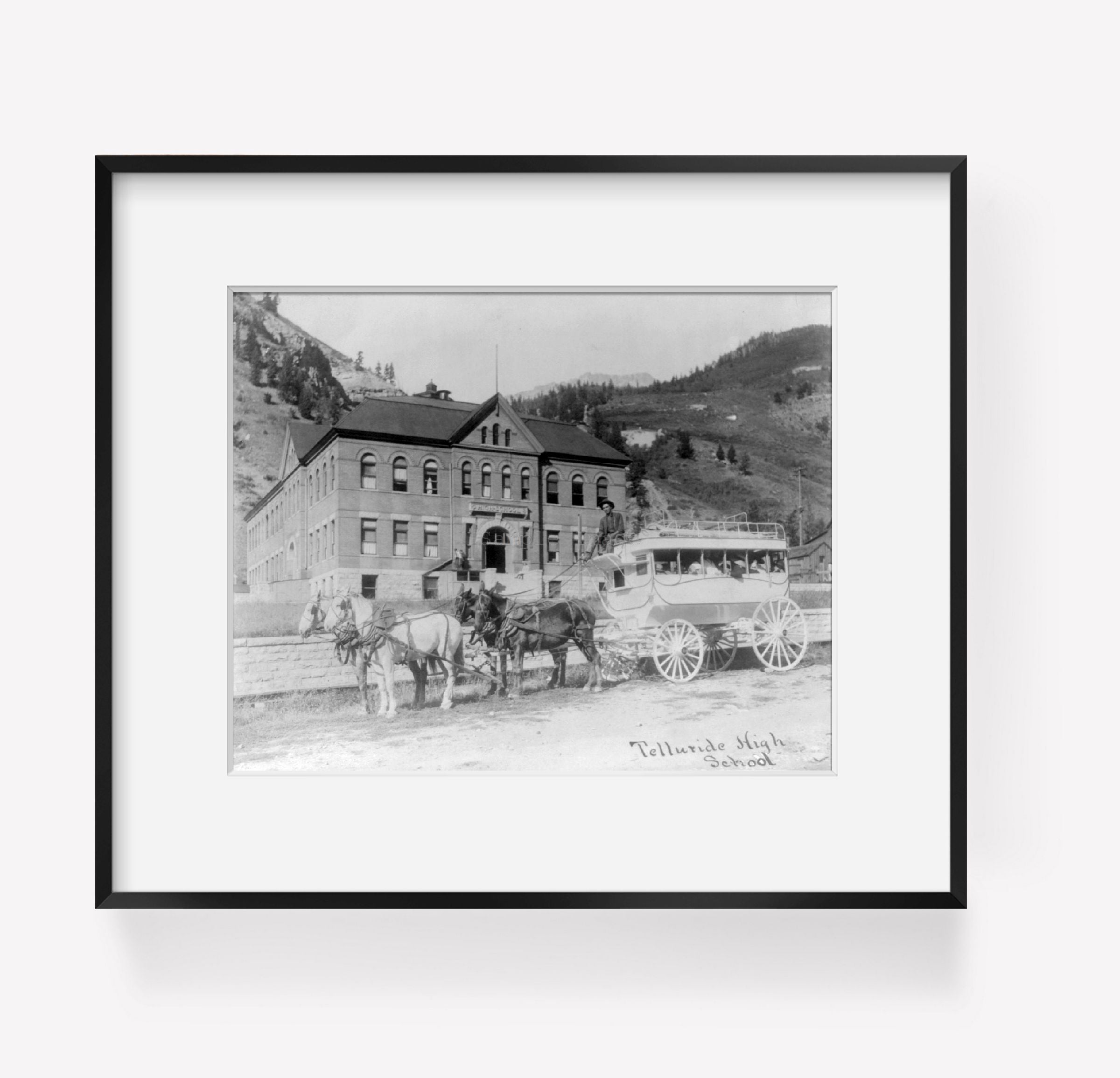 ca. 1910 photograph of Telluride high school Summary: Driver and bus drawn by fo