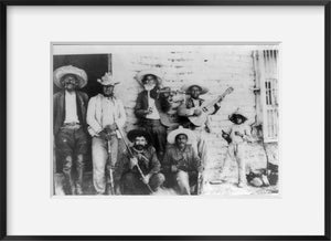 Photo: group of Mexican Insurrectos posed with rifles, revolver, violin, guitar, c19