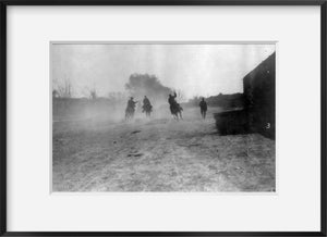 Photo: Mexican insurrectos riding away in a cloud of dust, horseback, c1912, guns