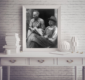 1930 Photo Man and woman (Mr. & Mrs. Newt Mann) seated in doorway