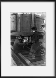 1917 Photo Women subway workers, N.Y.C., 1917: guard kneeling over car coupling