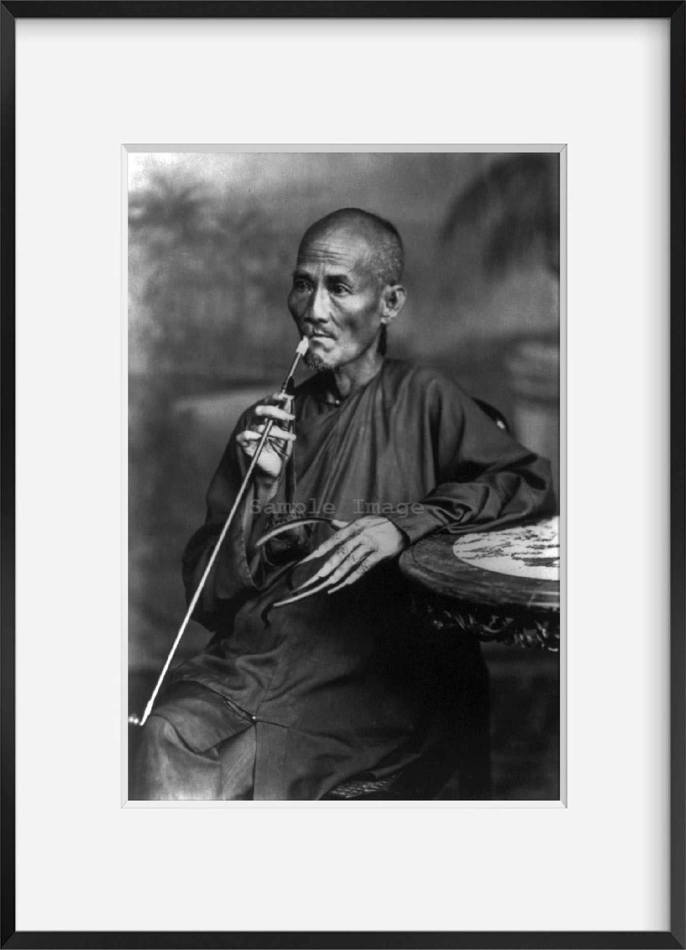 Photo: Old Chinaman, smoking long pipe, c1880, long fingernails