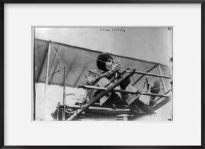Photo: Hélène Dutrieu, 1877-1961, cycling world champion, aviator, seated in airplan