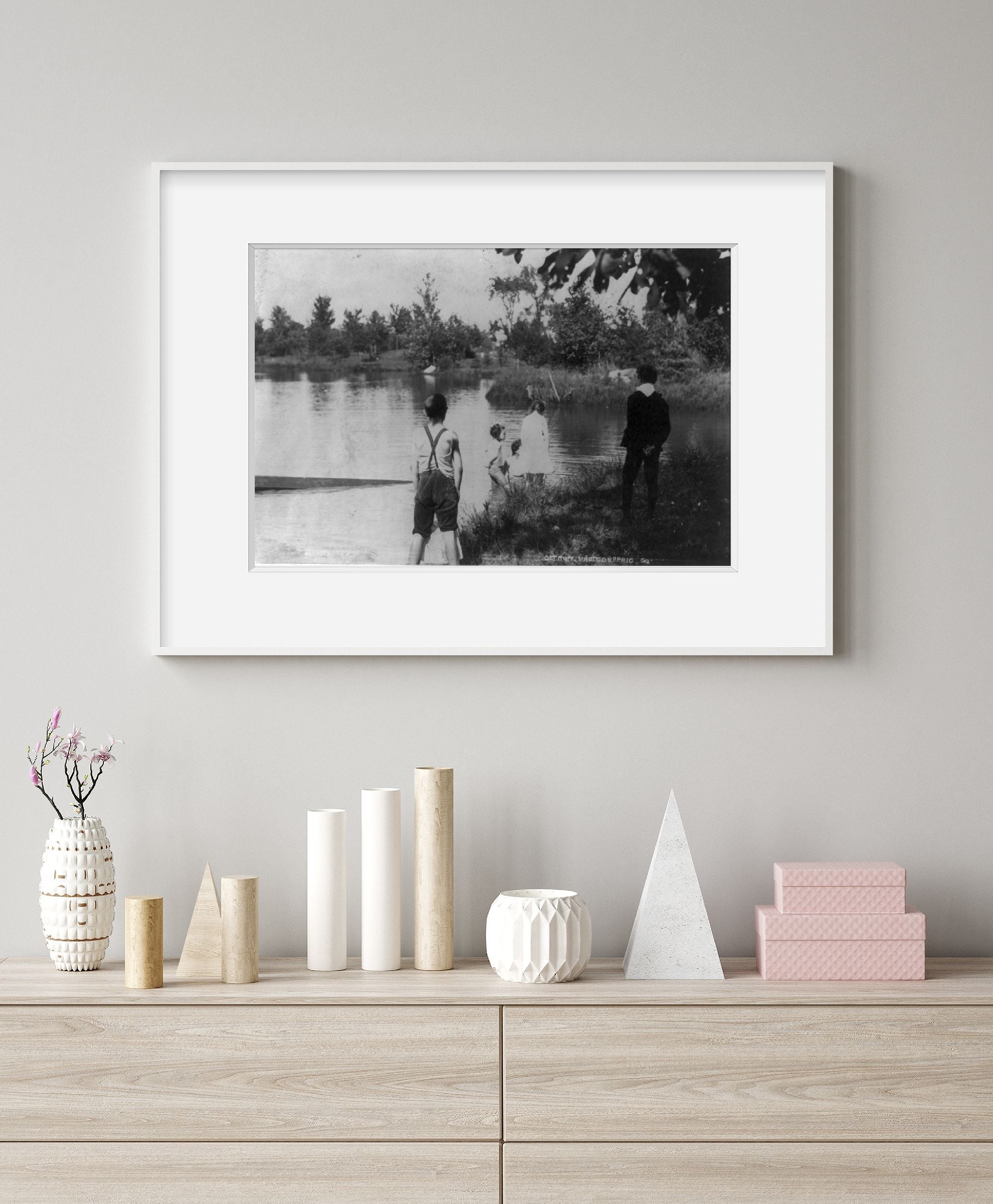 Photograph of Children wading at edge of lake