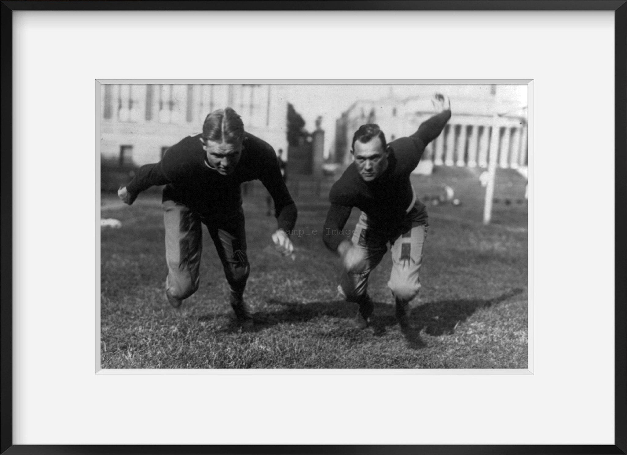 Photo: Healy, tackle, Brown, center, on Columbia Football Team, 2 men lunging forward