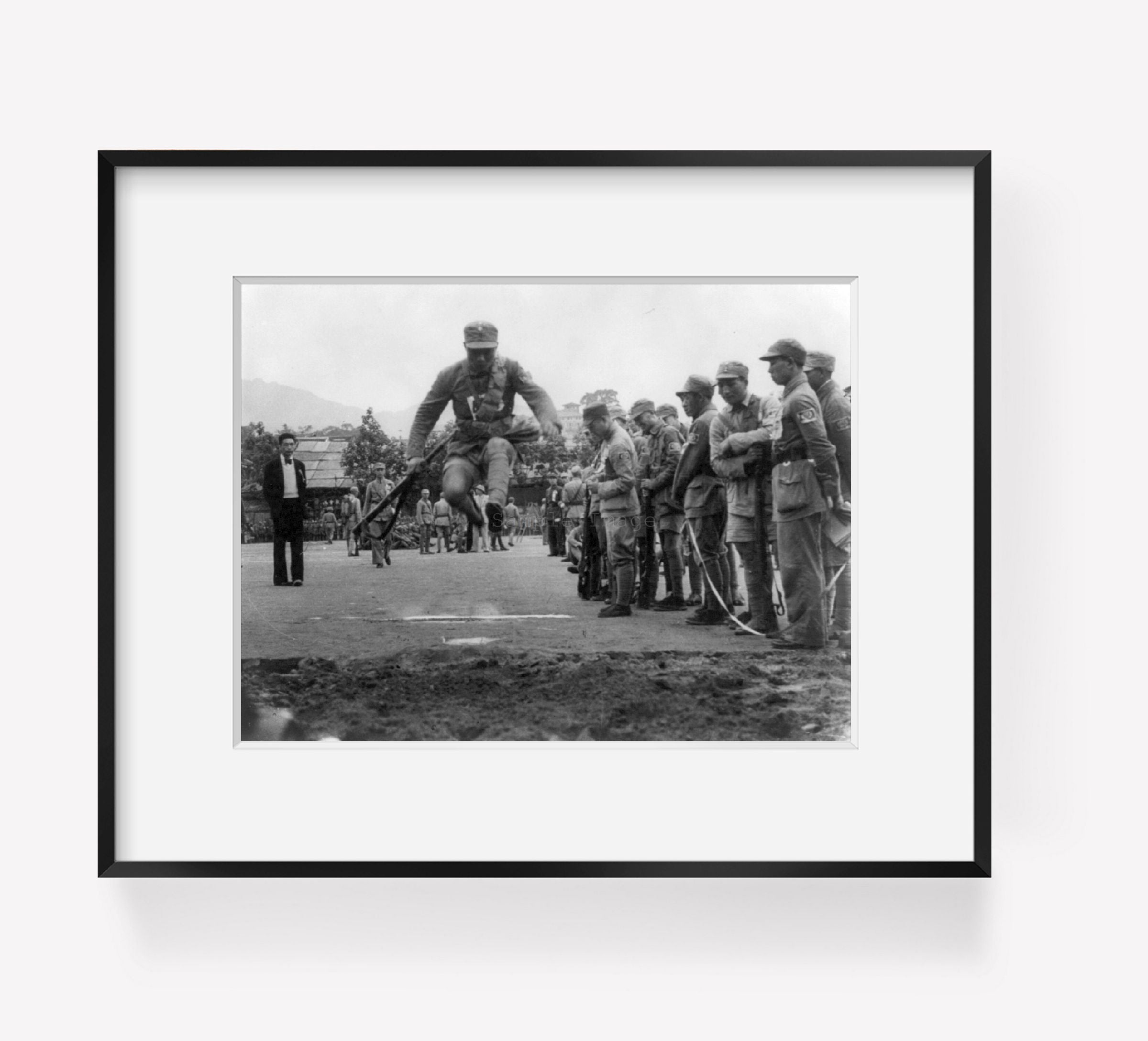 Photo: Chinese soldier making broad jump [betw. 1938 and 1943]