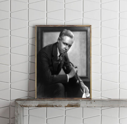 1925 photograph of Carl Van Vechten, seated, facing right, holding cane and hat