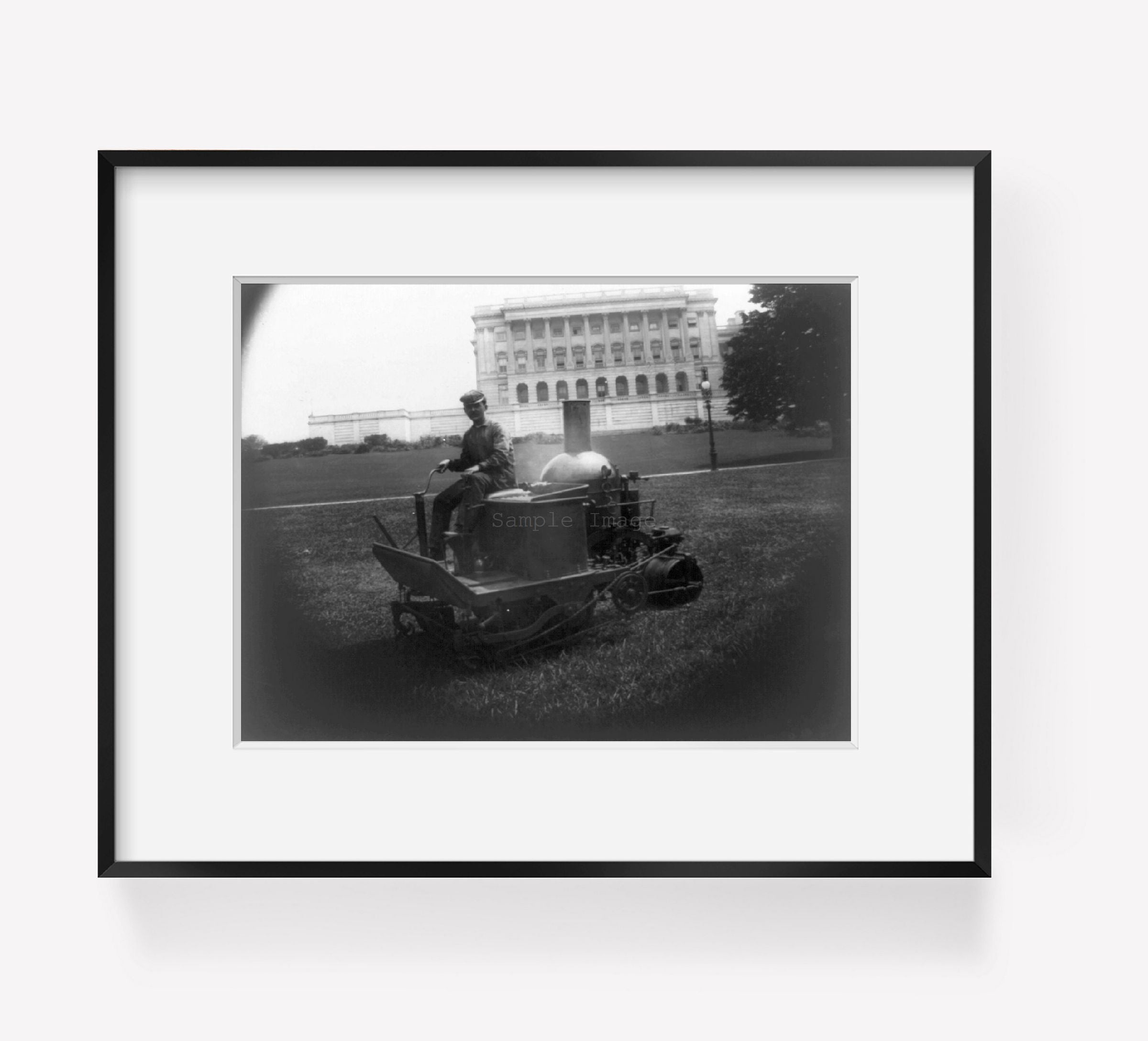 ca. 1903 photograph of Capitol grounds Summary: Man on steam-driven machine in f