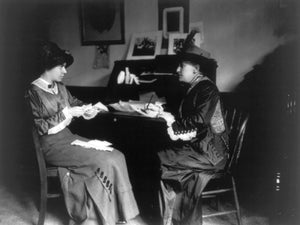 Photo: Helen Hamilton Gardener, 1853-1925, Alice Paul, 1885-1977, suffragist, at desk